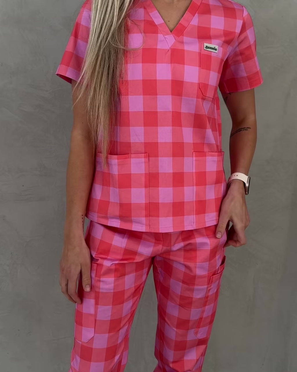 Video of Athena Scrub Set by Bennie, pink checkered scrubs for product detail videography.
